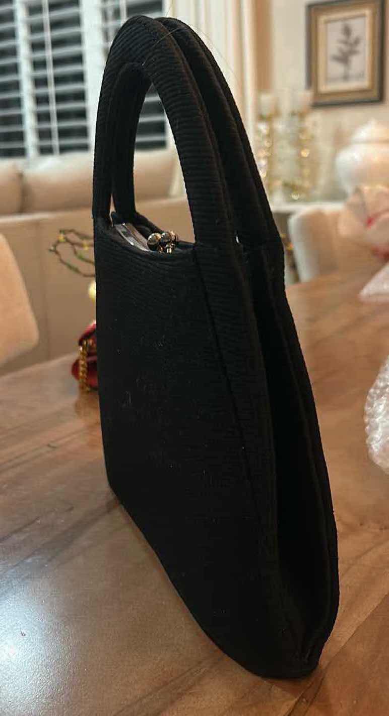 Photo 1 of IMITATION VINTAGE PRADA FEATURING A RIGID TOP HANDLE FRAME AND A KISS LOCK CLOSURE