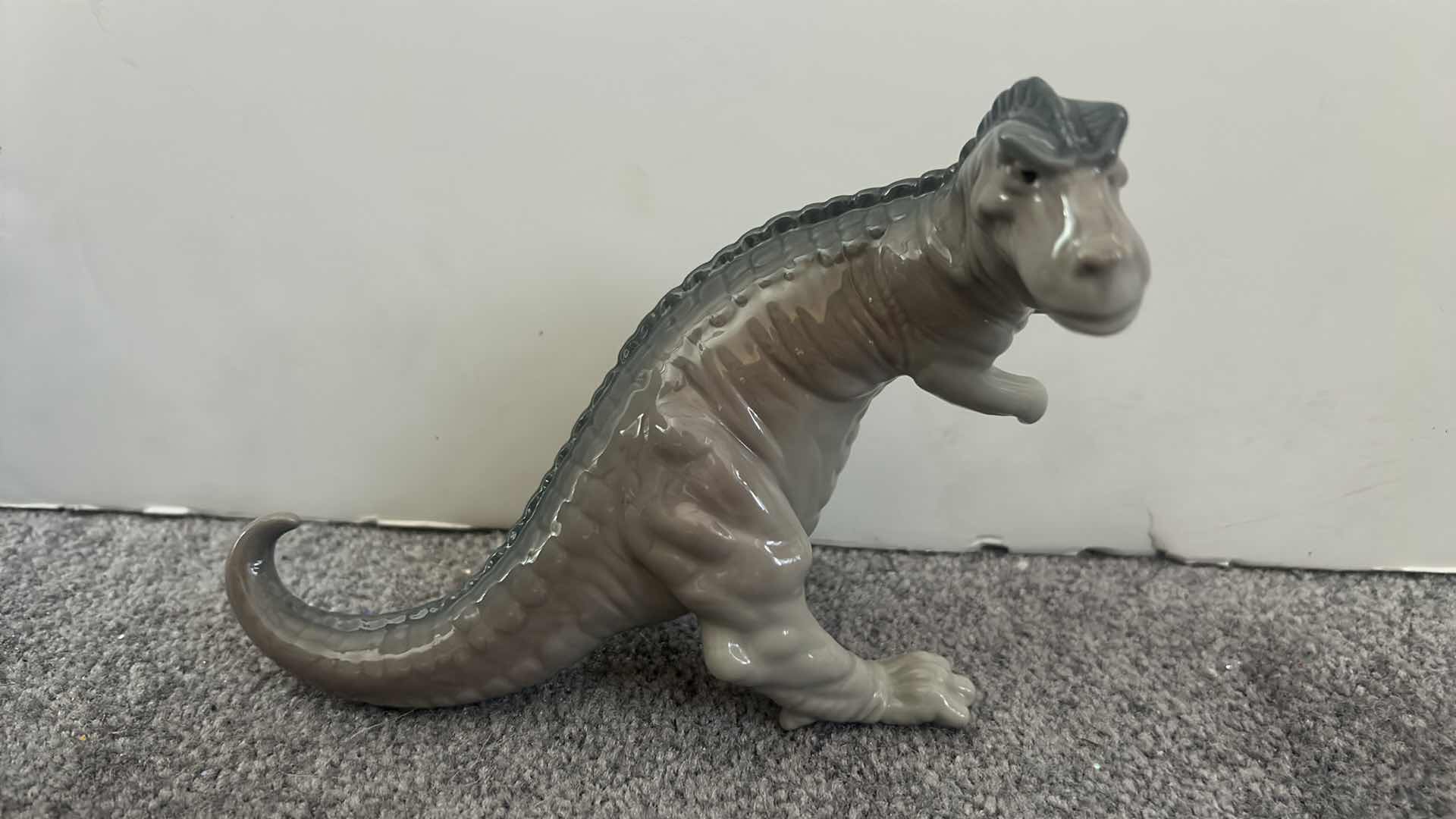 Photo 1 of LLADRO PORCELAIN DINOSAUR FIGURINE