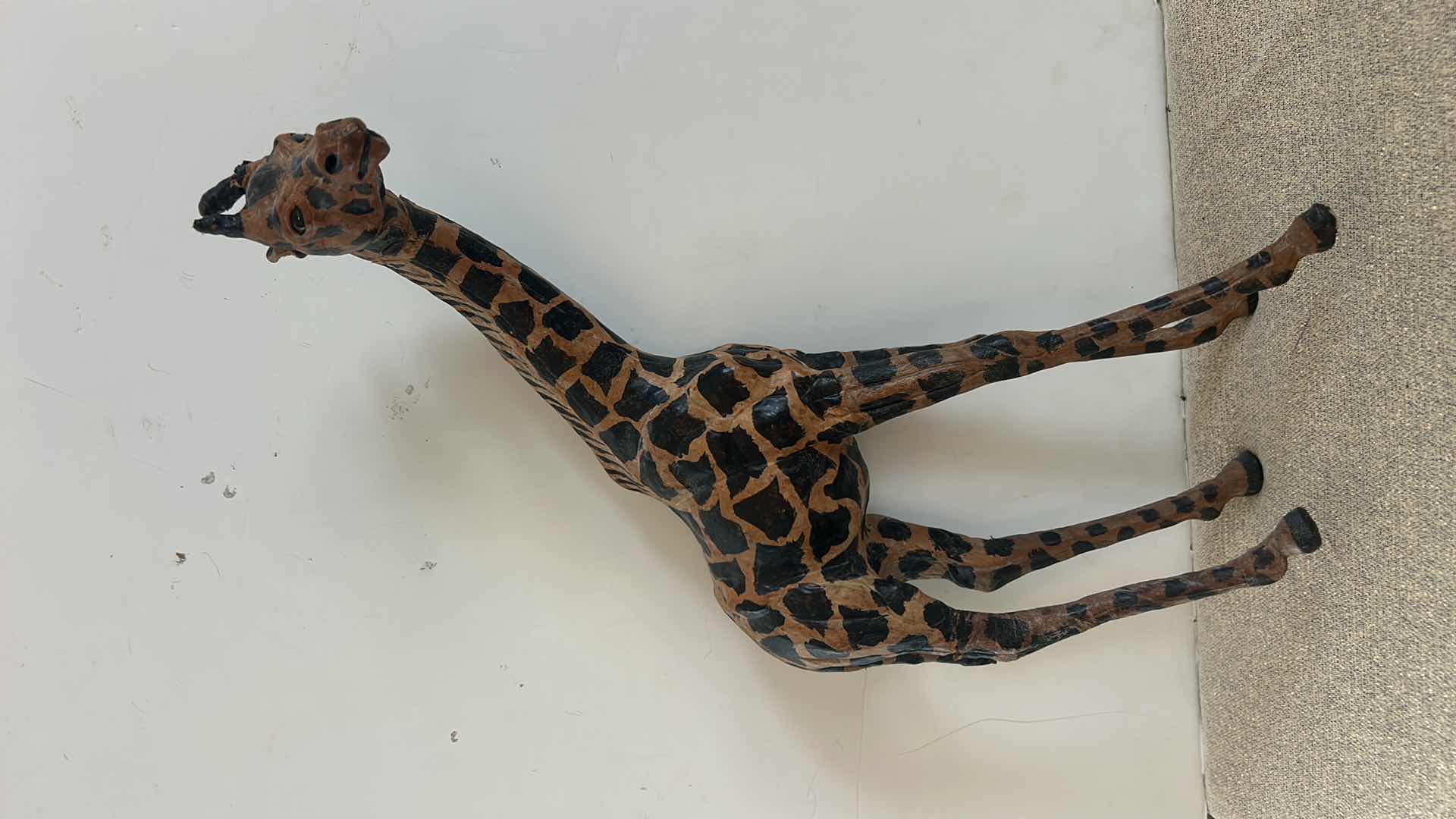 Photo 1 of WOODEN GIRAFFE FIGURINE H17”