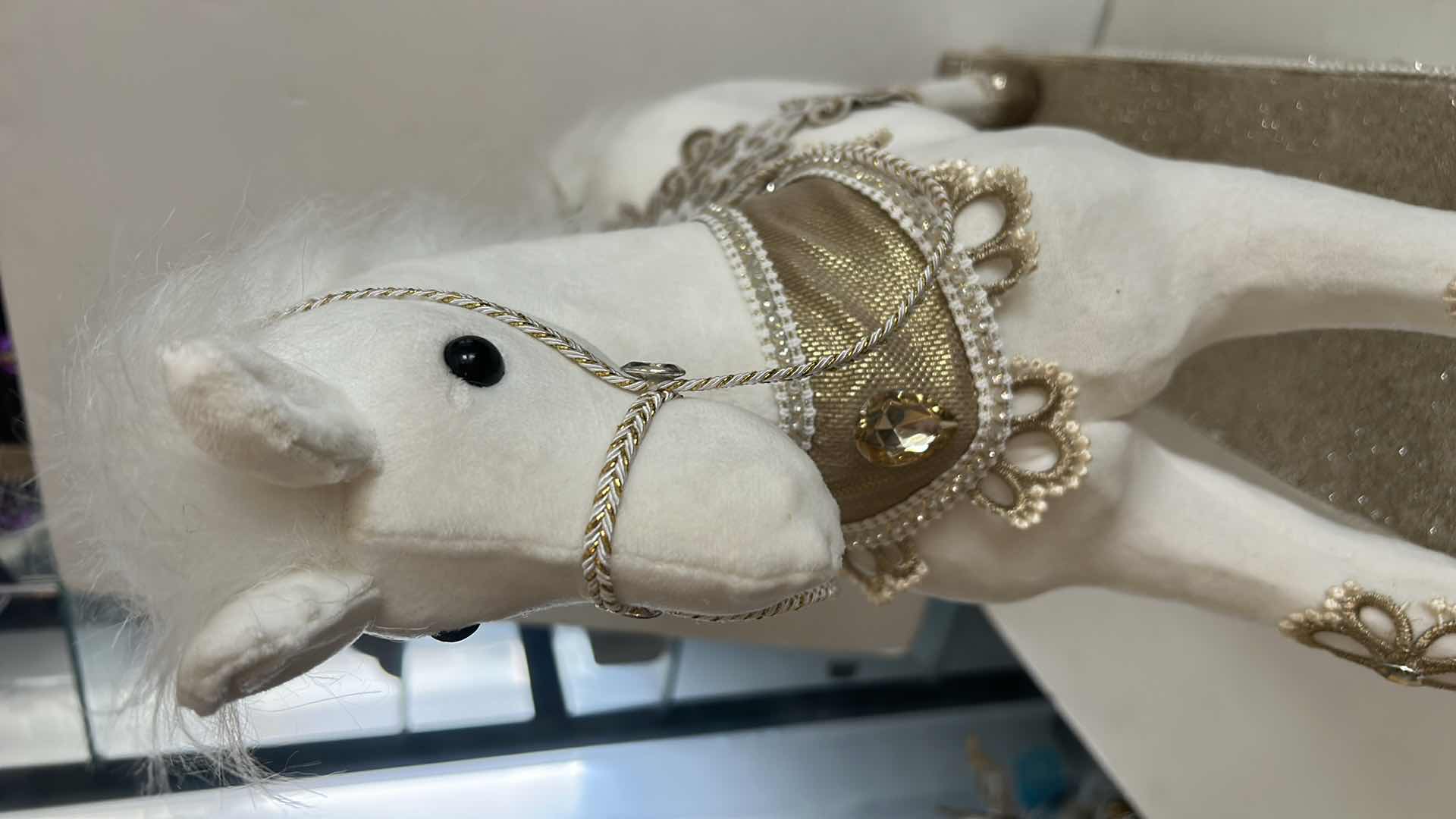 Photo 1 of WHITE AND GOLD FESTIVE ROCKING HORSE 27” x 7” 8” x H23”