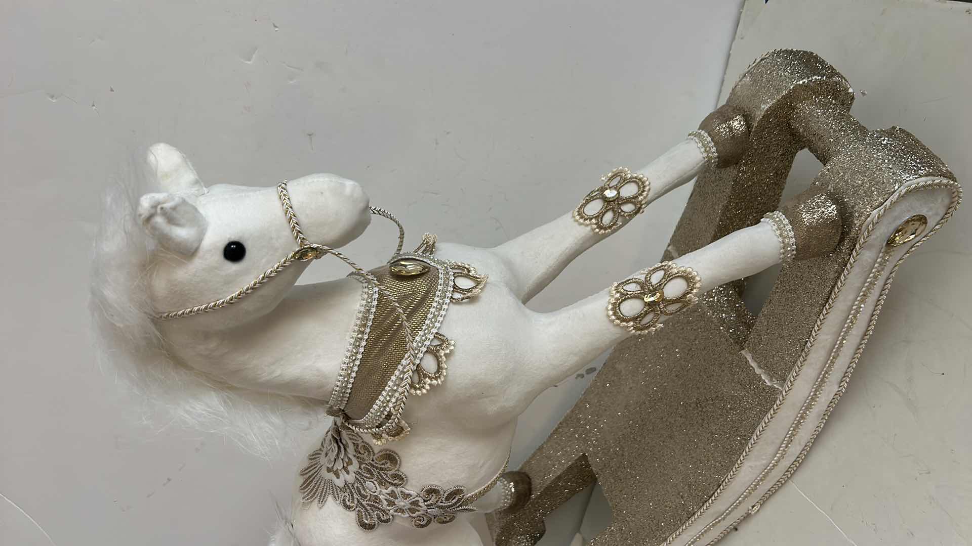 Photo 1 of WHITE AND GOLD FESTIVE ROCKING HORSE 27” x 7” 8” x H23”
