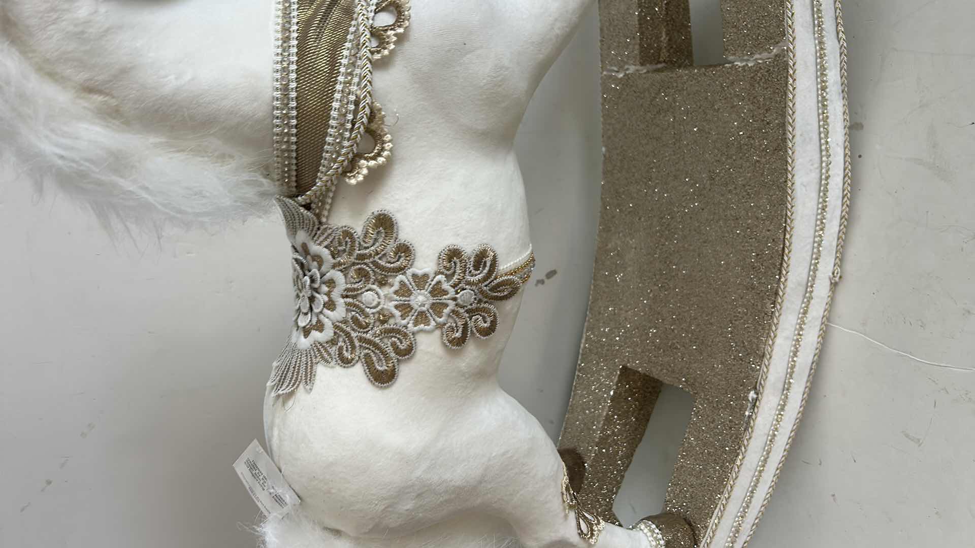 Photo 1 of WHITE AND GOLD FESTIVE ROCKING HORSE 27” x 7” 8” x H23”
