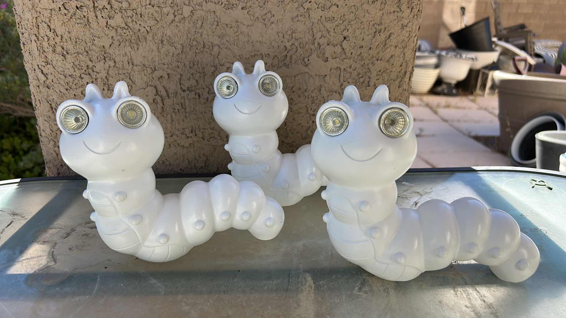 Photo 1 of SNAIL AND CATERPILLAR FIGURINES, OUTDOOR DECOR H6.5”