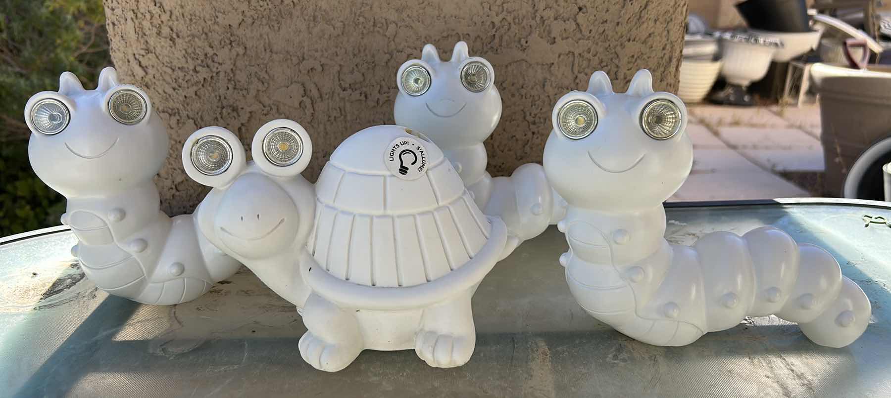 Photo 1 of SNAIL AND CATERPILLAR FIGURINES, OUTDOOR DECOR H6.5”