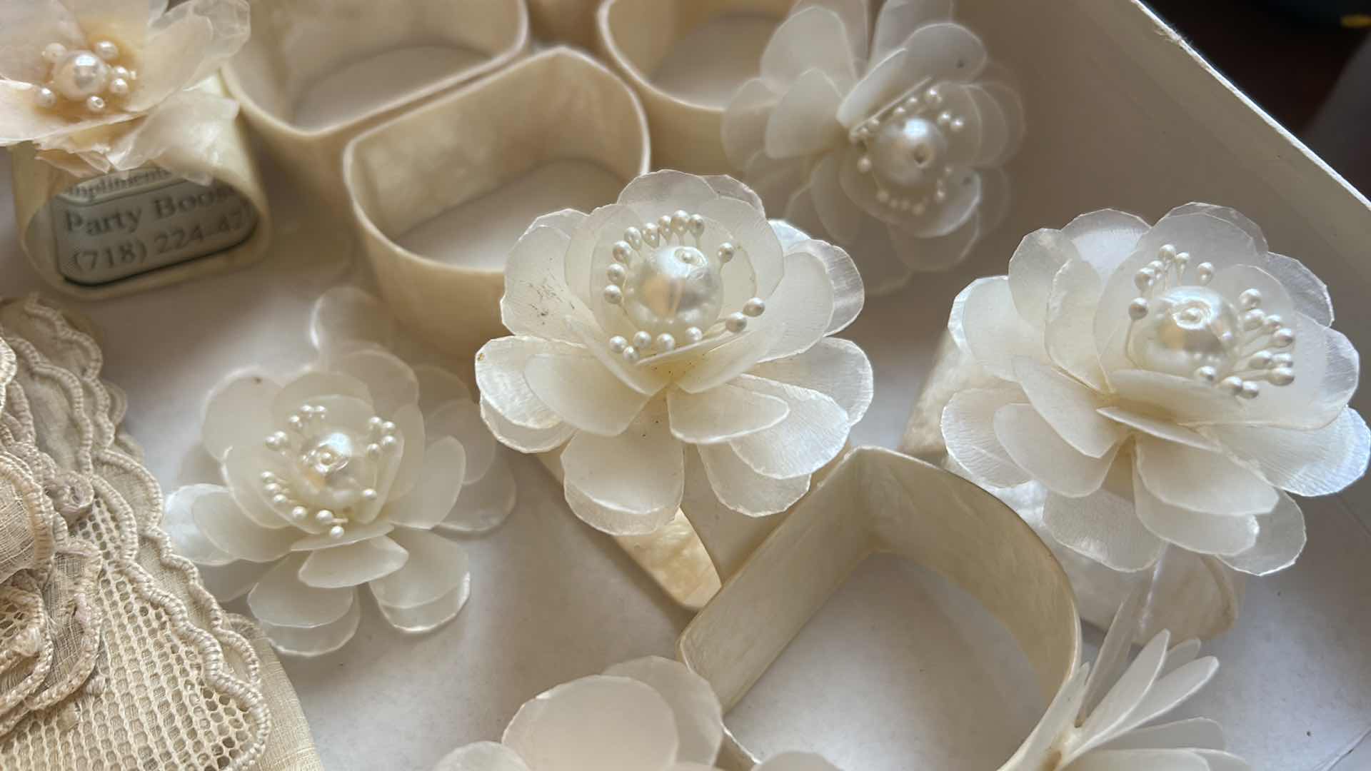 Photo 1 of VINTAGE IVORY TABLE LINENS & CAPIZ SHELL & MOTHER-OF-PEARL, FLORAL NAPKIN RINGS
