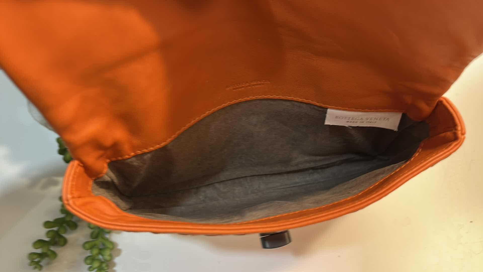 Photo 1 of BOTTEGA VENETA: VINTAGE ORANGE INTRECCIATO LEATHER TURN-LOCK CLUTCH BAG