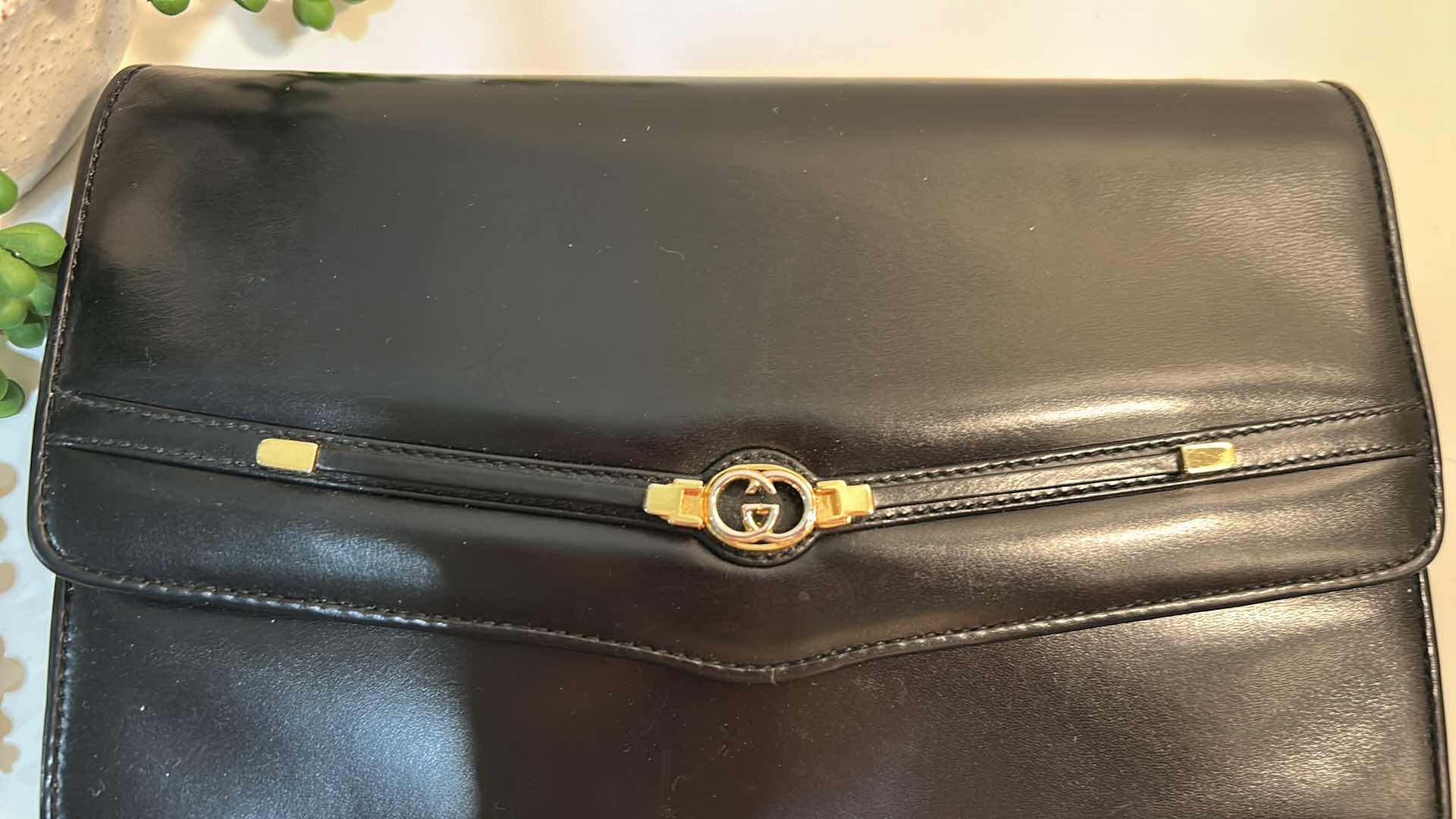 Photo 1 of AUTHENTIC GUCCI: VINTAGE BLACK SMOOTH LEATHER HORSEBIT ENVELOPE CLUTCH BAG