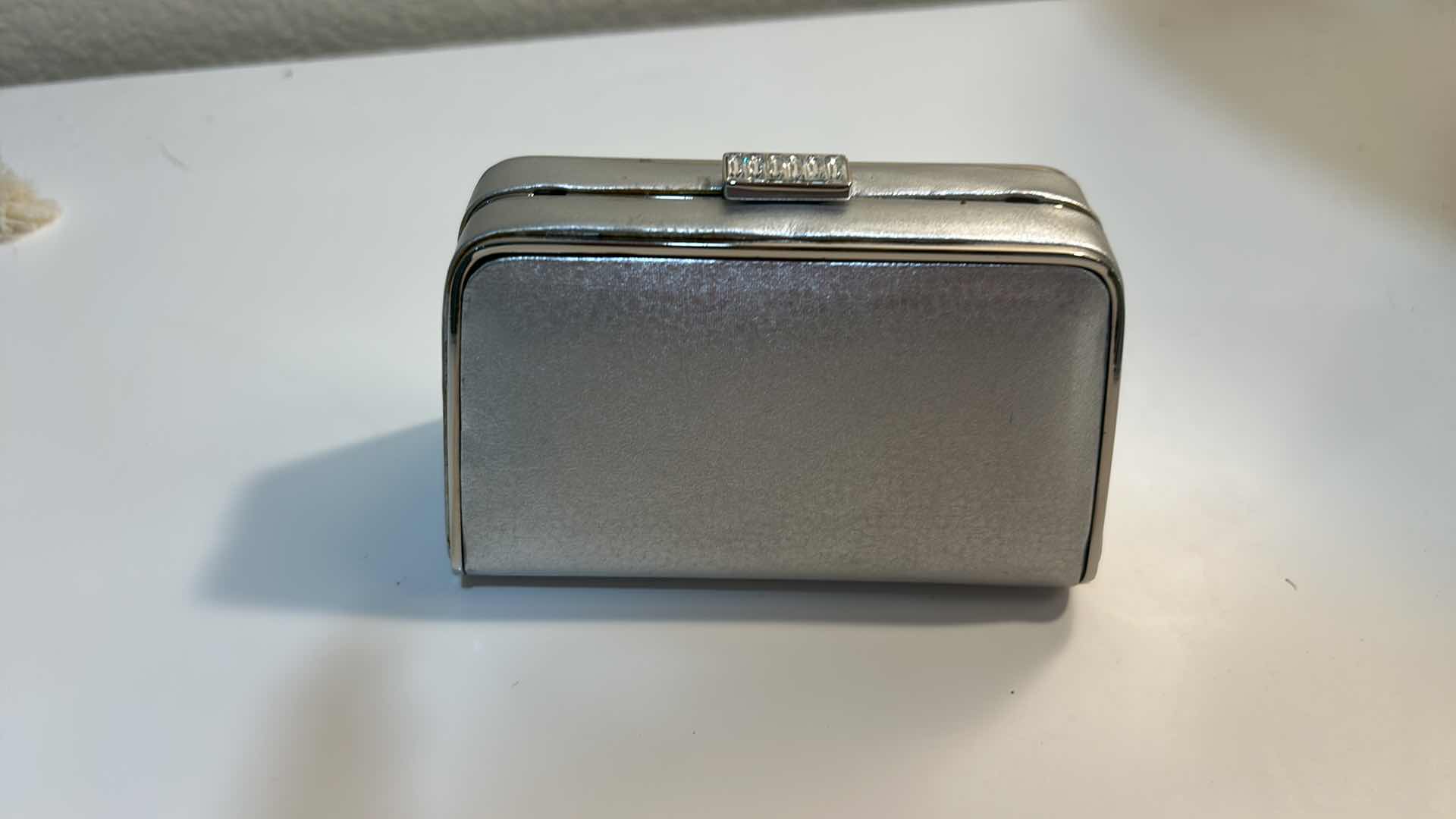 Photo 1 of SMALL ST JOHN SILVER METALLIC EVENING CLUTCH BAG