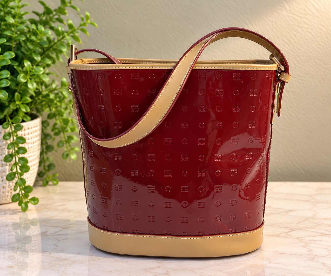 Photo 1 of ARCADIA BURGUNDY EMBOSSED MONOGRAM PATENT LEATHER BUCKET BAG