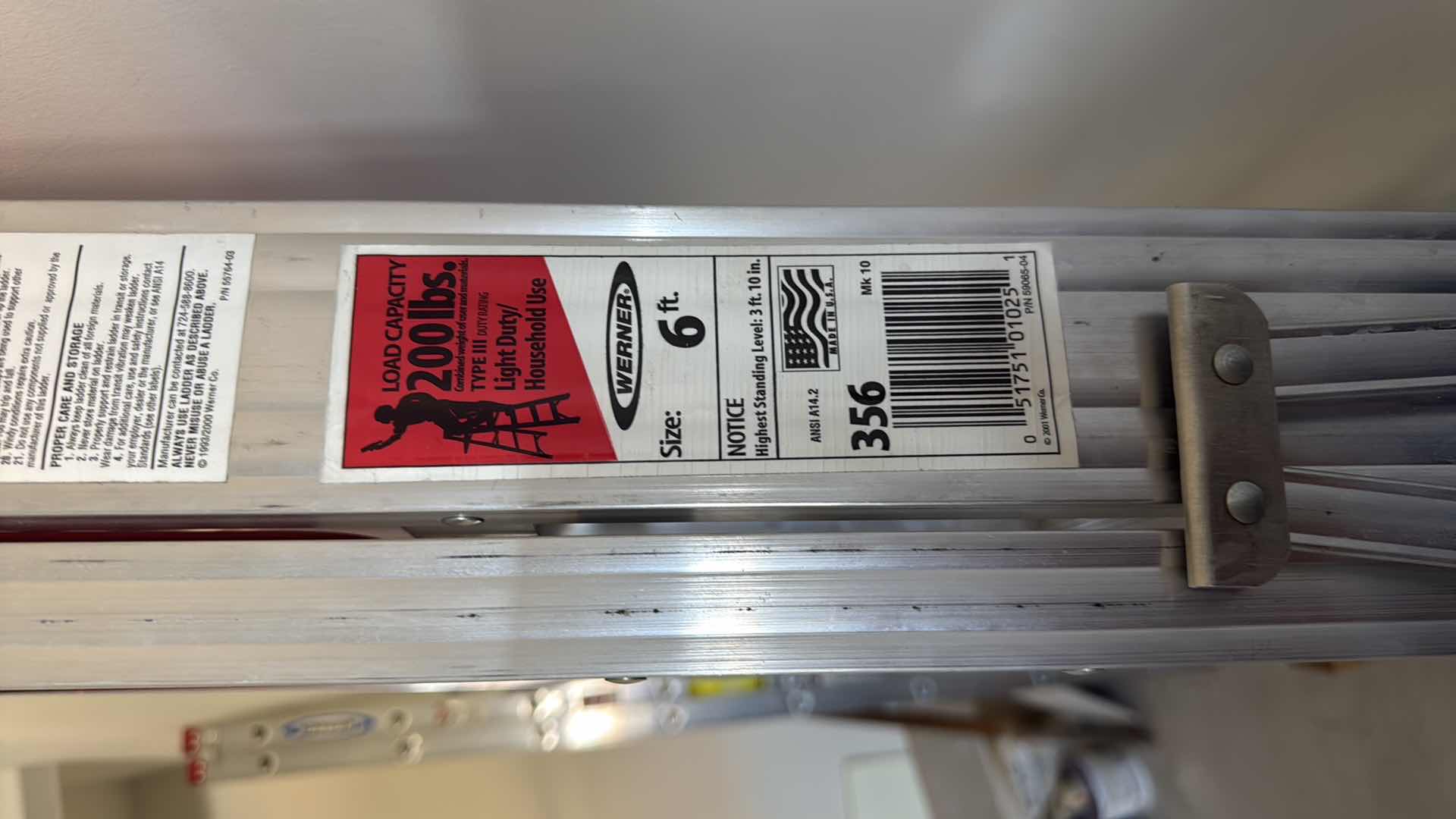 Photo 1 of WERNER ALUMINUM 6’ LADDER, SMALL STEP STOOL