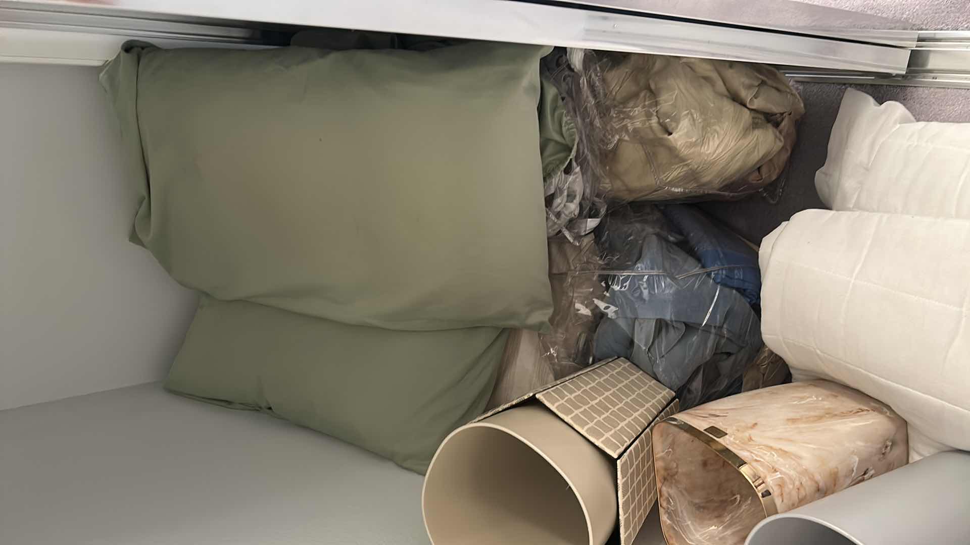 Photo 1 of CONTENTS OF CLOSET PILLOWS SHEETS TOWELS TRASH CANS