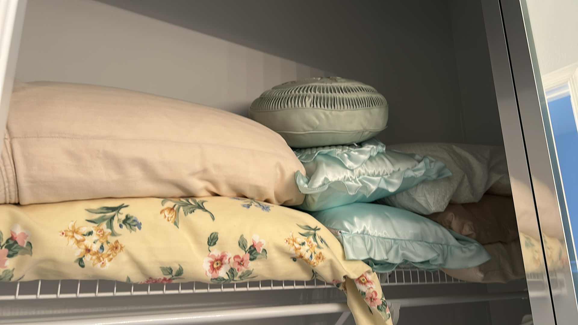 Photo 1 of CONTENTS OF CLOSET PILLOWS SHEETS TOWELS TRASH CANS