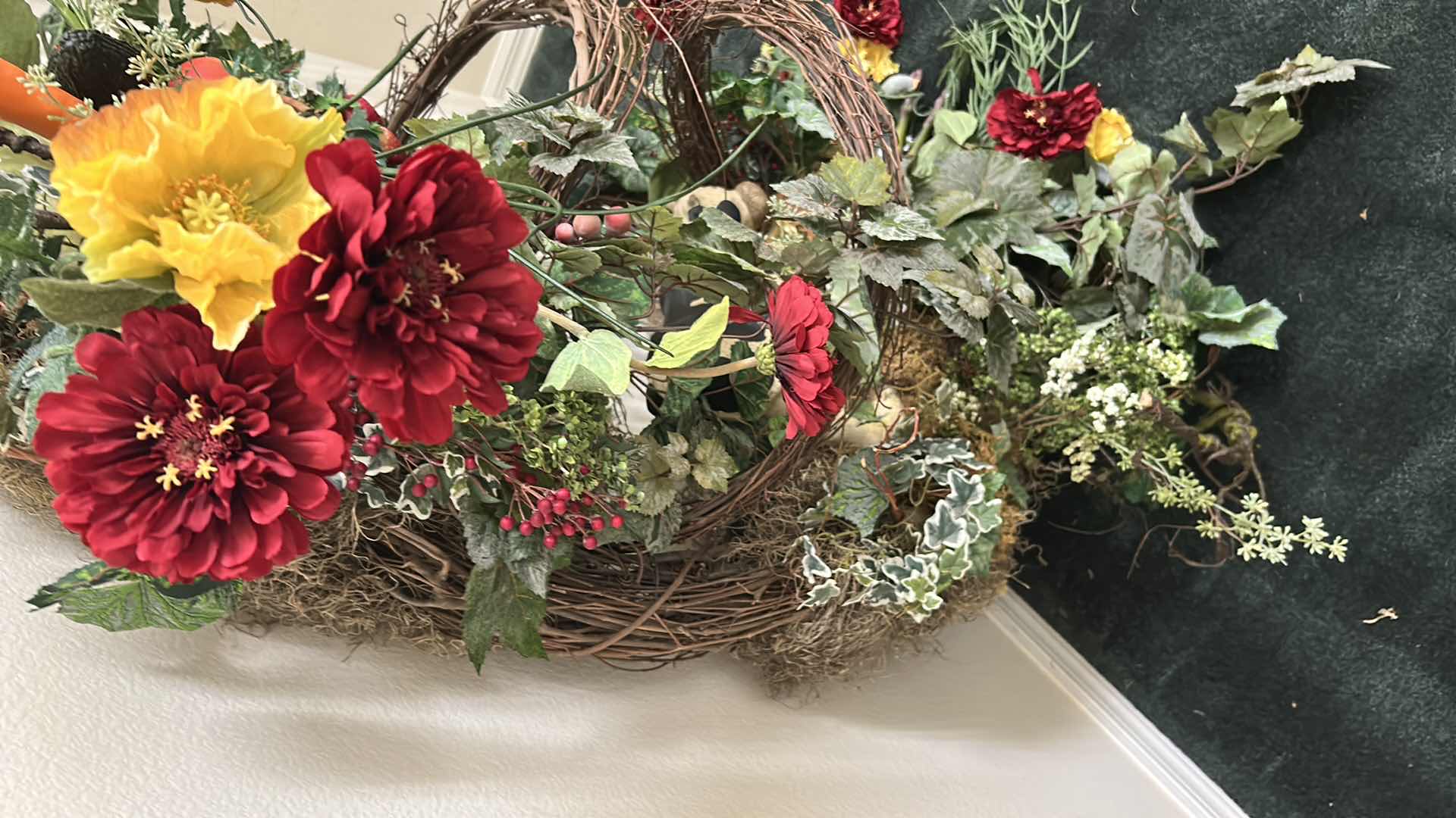 Photo 1 of AUTUMN HARVEST GRAPEVINE WREATH W FLORAL AND COW VEGETABLE DESIGN H 30" X 51" $90