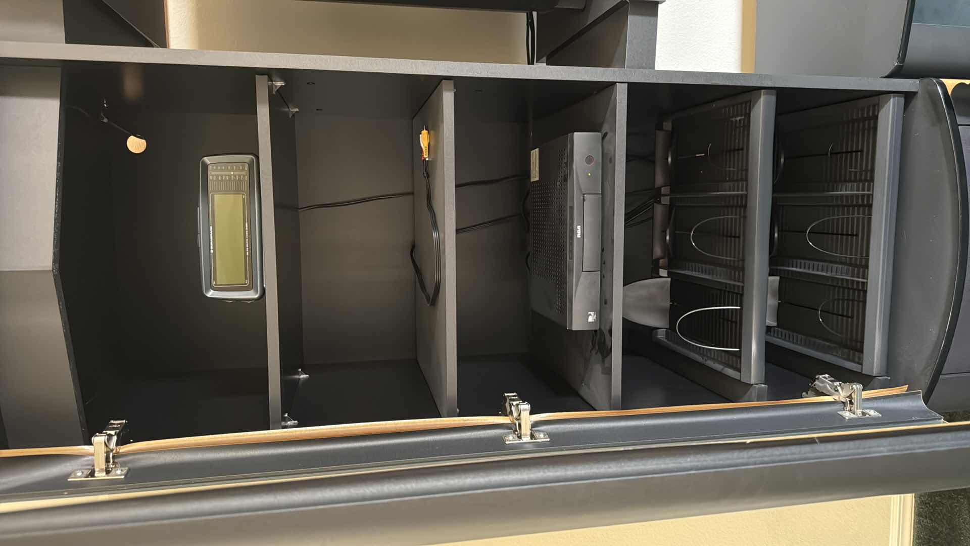 Photo 1 of BLACK ENTERTAINMENT CENTER W ALL ELECTRONICS (84”x21” H77”)