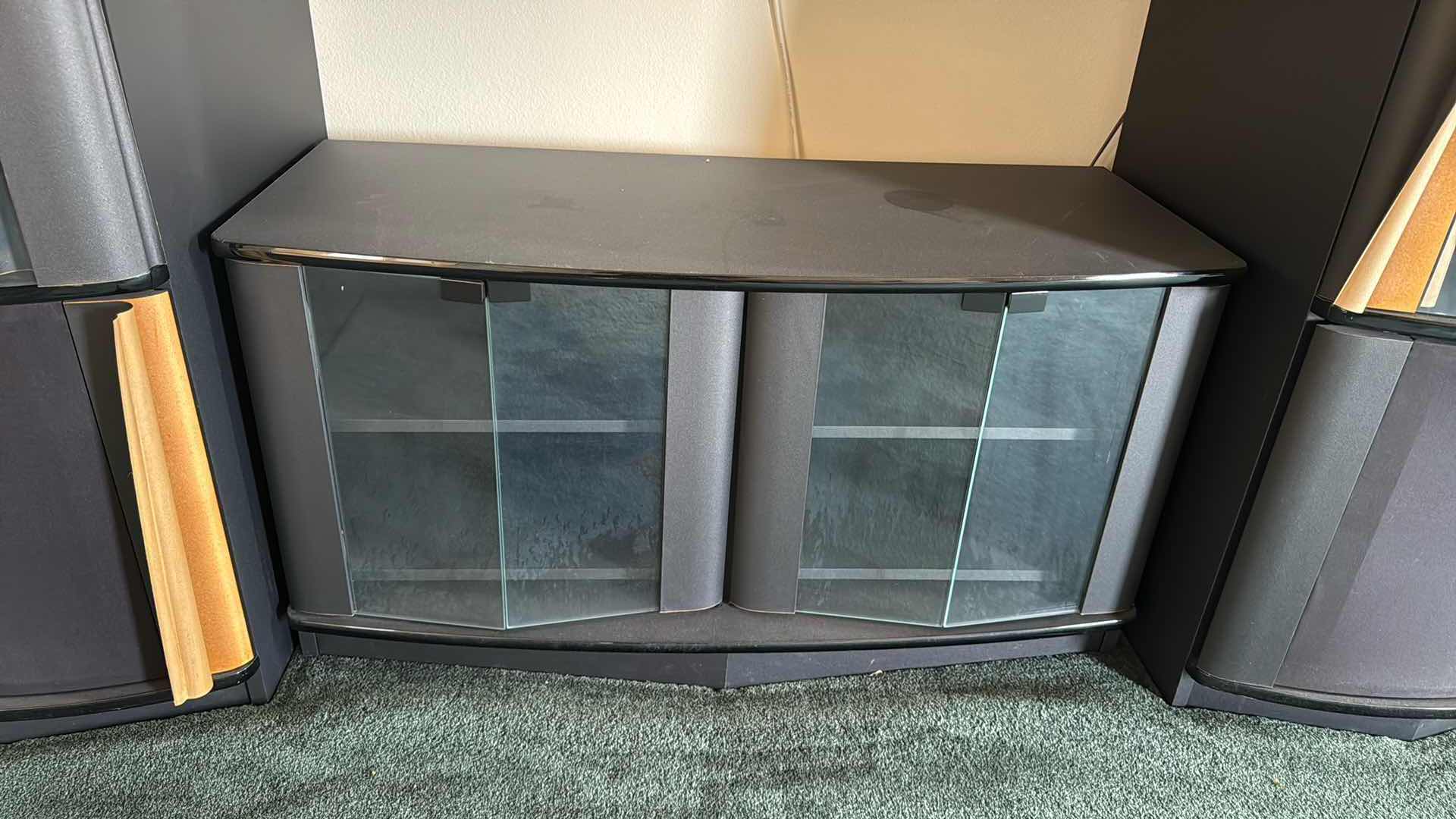 Photo 1 of BLACK ENTERTAINMENT CENTER W ALL ELECTRONICS (84”x21” H77”)