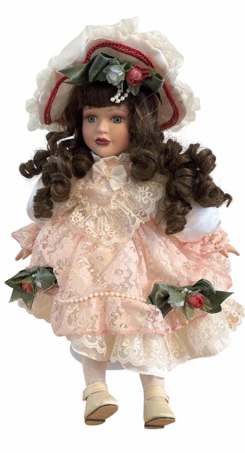 Photo 1 of VINTAGE PORCELAIN DOLL W BRIM HAT H17”