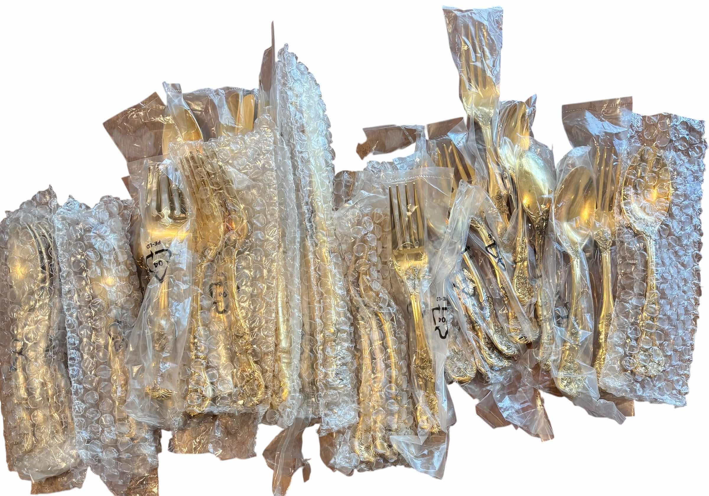 Photo 1 of GOLD COLORED SILVERWARE SET (APPROXIMATELY 40 PIECES)
