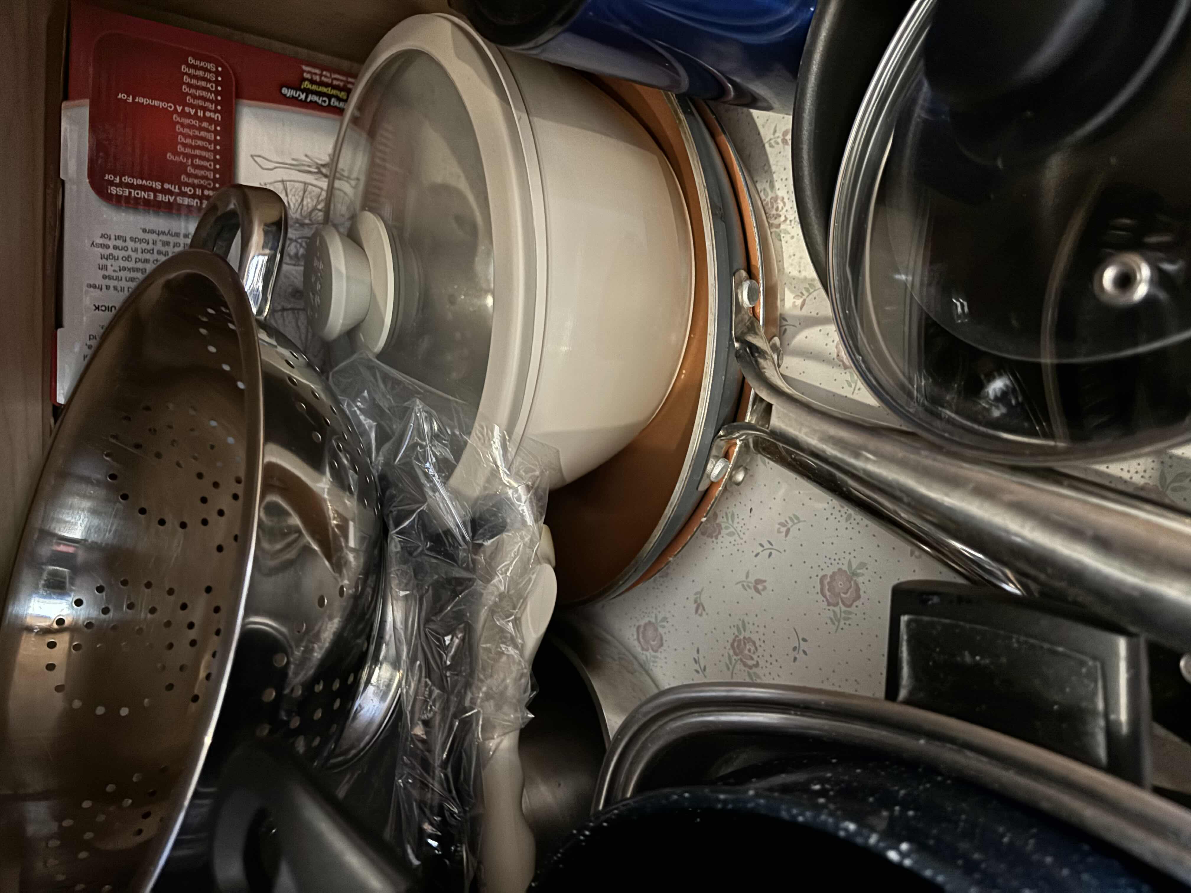 Photo 1 of CONTENTS OF KITCHEN CABINET