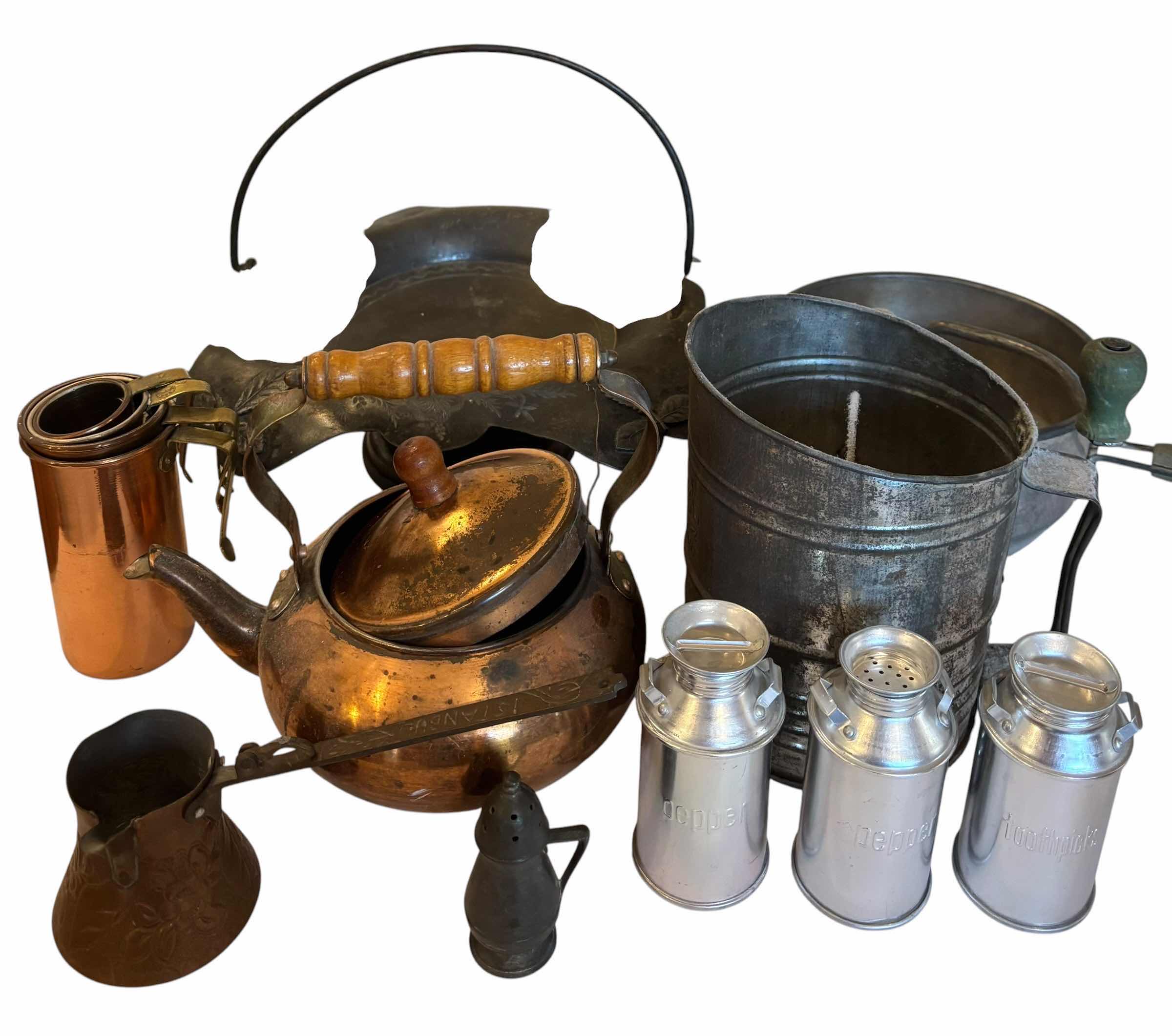 Photo 1 of COLLECTION OF METAL KITCHEN GADGETS: COPPER & BRASS NESTING MEASURING CUPS, FRUIT BOWL WITH HANDLE, FLOUR SIFTER