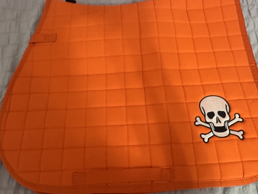 Orange skull saddle pad