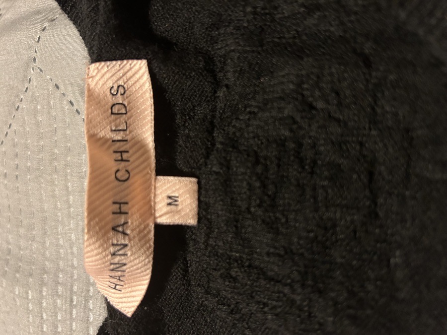 Hannah Childs riding sweater