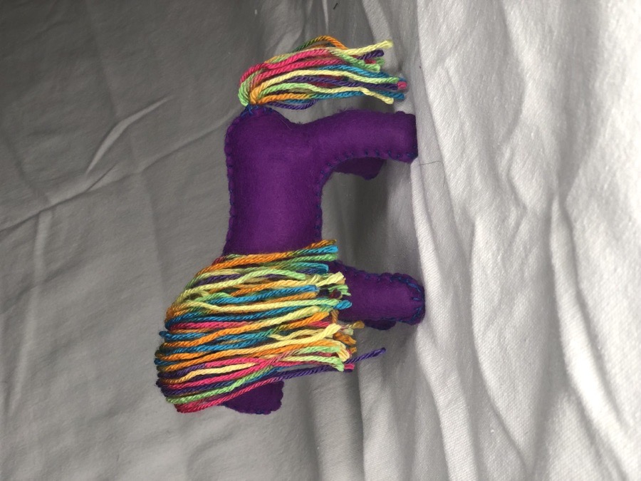 Hand sewn purple toy horse