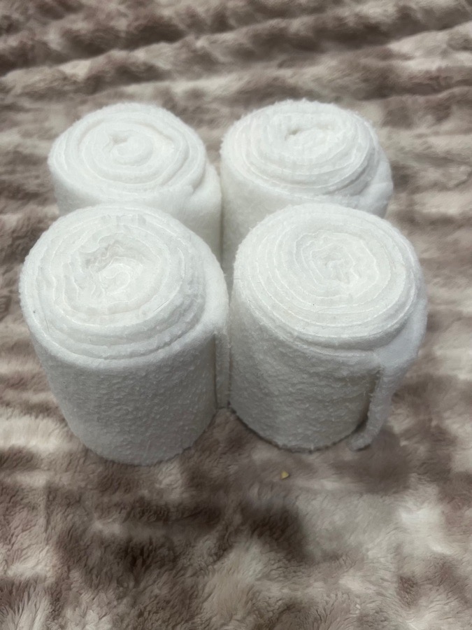 White pony polo wraps