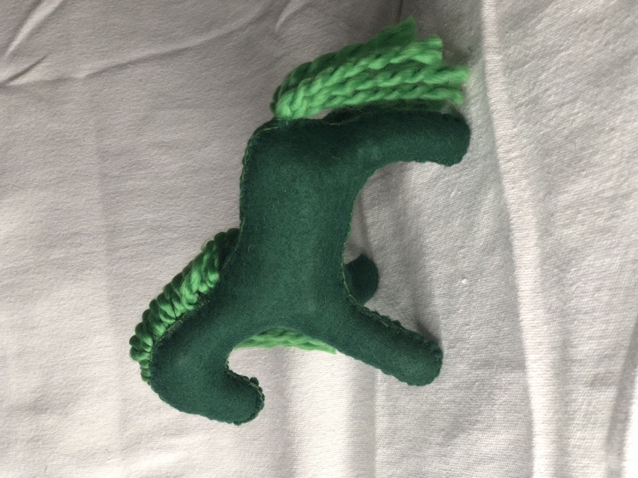 Hand sewn green toy horse