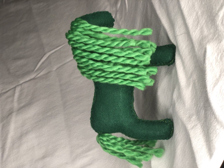 Hand sewn green toy horse